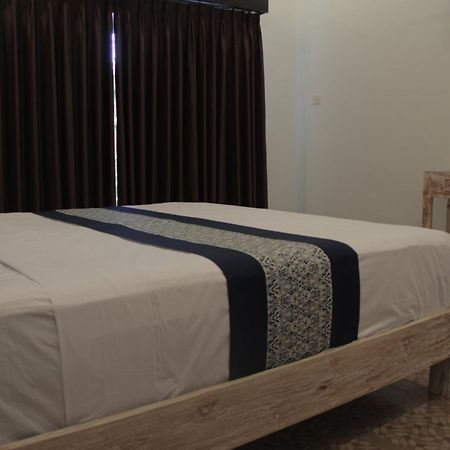 Nyoman Guesthouse Canggu חדר תמונה