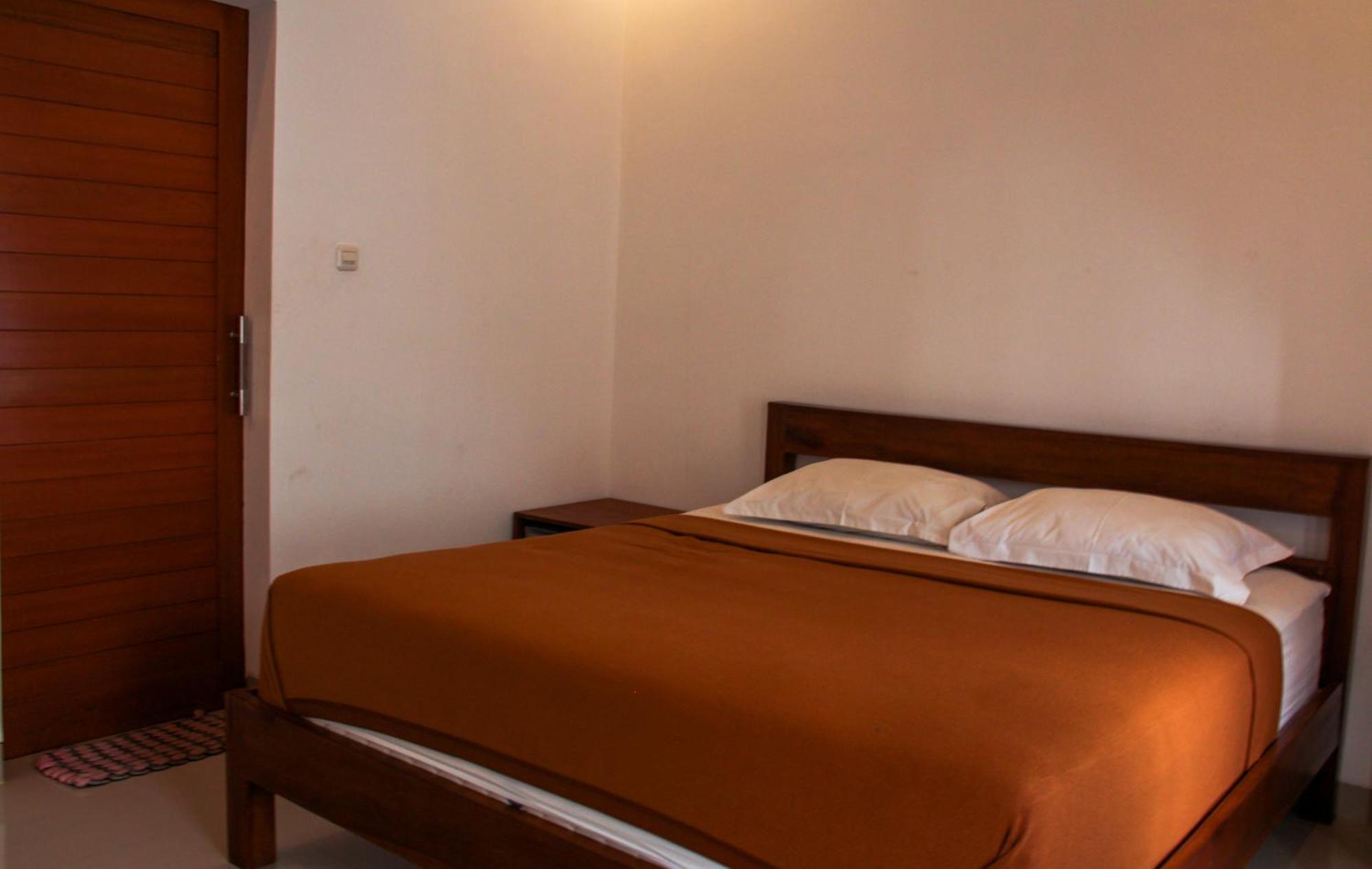 Nyoman Guesthouse Canggu חדר תמונה