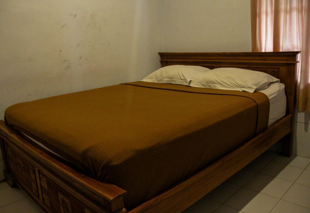 Nyoman Guesthouse Canggu חדר תמונה