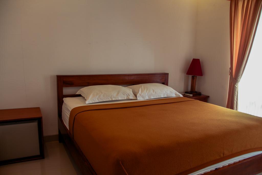 Nyoman Guesthouse Canggu חדר תמונה