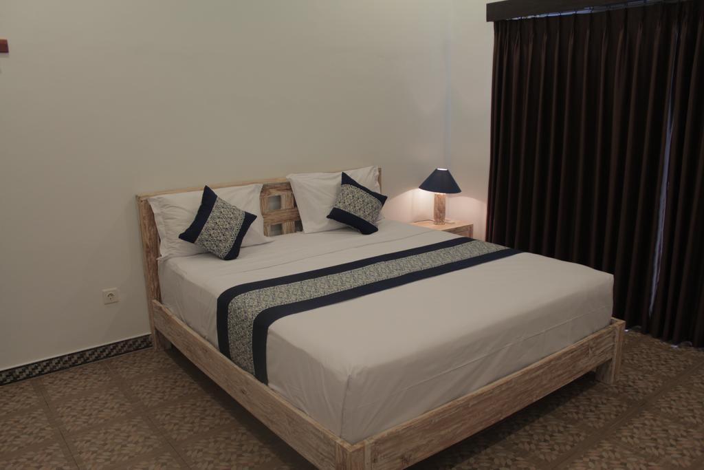 Nyoman Guesthouse Canggu חדר תמונה